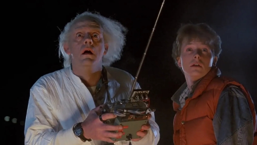 Doc Brown (Christopher Lloyd) and Marty McFly (Michael J. Fox) react with alarm in Back to the Future