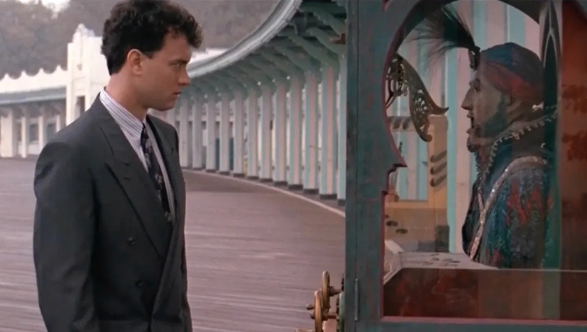 Josh (Tom Hanks) stares down the fortune-telling machine on the boardwalk in Big