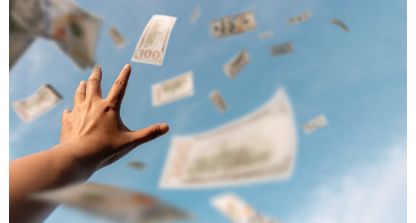 Hand reaching for money