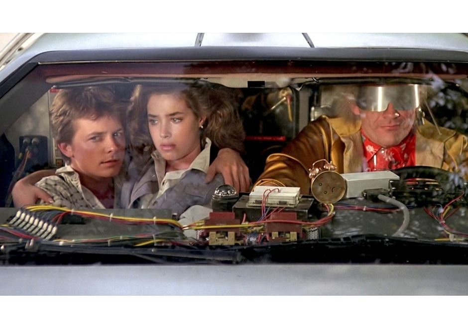 Michael J. Fox, Christopher Lloyd, and Claudia Wells in 'Back to the Future'
