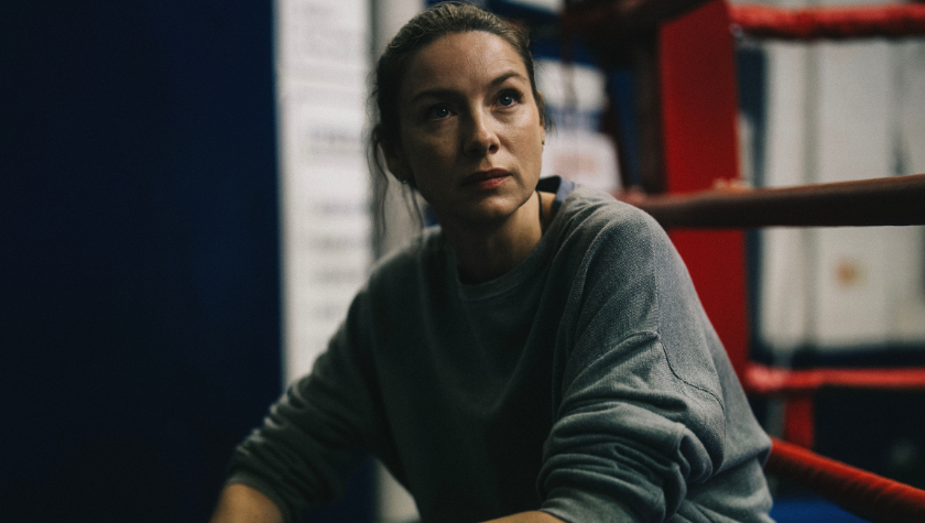 Caitríona Balfe sitting next to the ring in The Cut
