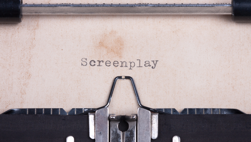 Screenplay written on a stained page in a typewriter