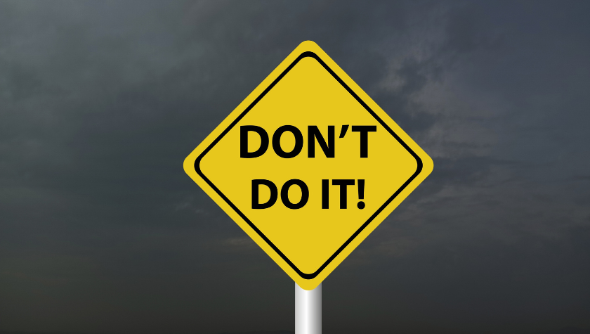 Yellow sign displaying words Don't Do It!